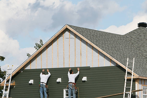 Professional Vinyl Siding technician working in Holly Springs, GA